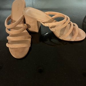 Tan Aldo suede sandals.